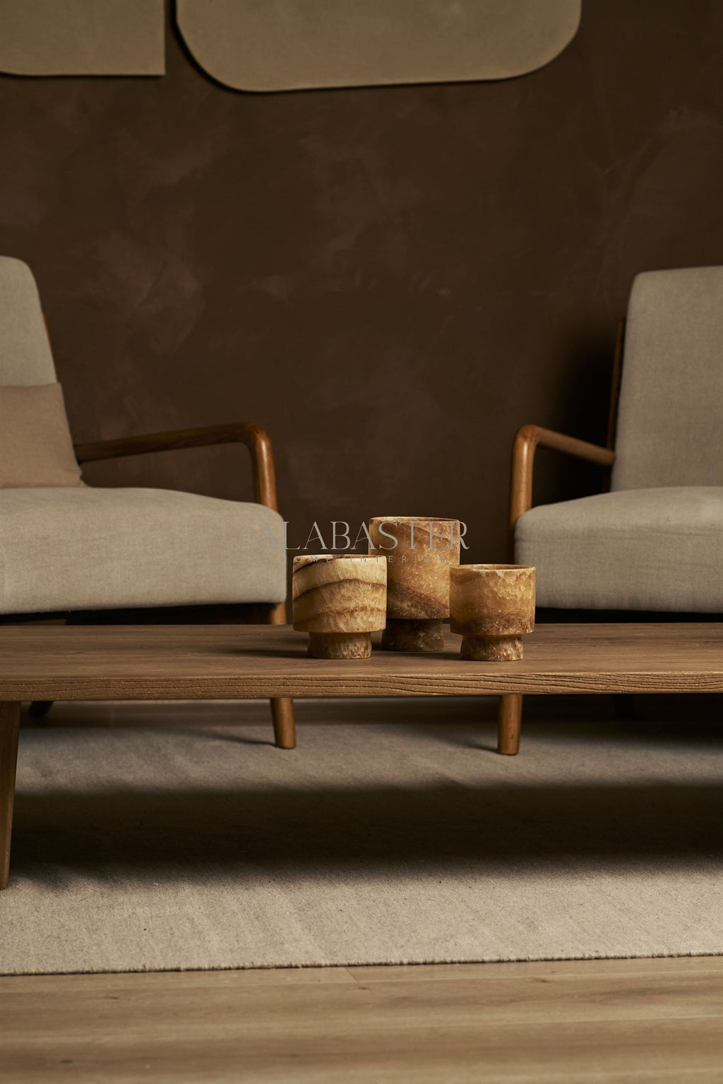 Alabaster waxinelichthouder Coupe met elegante coupevorm en warme lichtdoorlaat